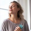 Load image into Gallery viewer, Woman holding 2 Medi Grade nasal rinse sachets