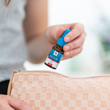 Load image into Gallery viewer, Olive oil ear drops bottle being placed inside a pouch
