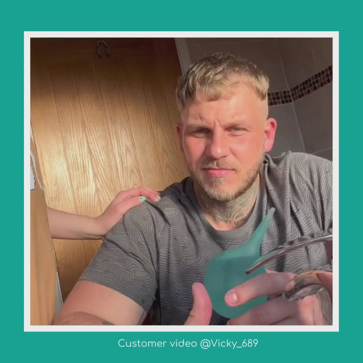 A video of a man using a Medi Grade Ear Bulb Syringe with earwax being drained from his ear