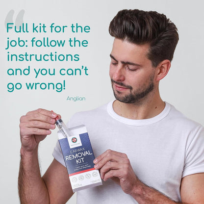 Man removing the ear syringe in its retail box with a customer review text saying its the full kit for the job