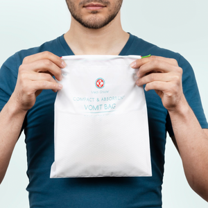 A man holding the Medi Grade Vomit Bag